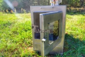 Stufa a legna esterna TimberIN Nordic External in acciaio inox con porta in vetro, in giardino