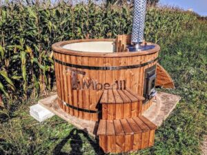 TimberIN Nordic Flex – vasca interna blu in polipropilene con panche in legno su un prato