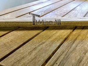 TimberIN Nordic Flex – dettaglio del coperchio in legno a segmenti con traversa e logo TimberIN