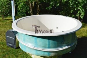 TimberIN Nordic InGround Comfort incassata, con camino in acciaio inox della stufa a legna